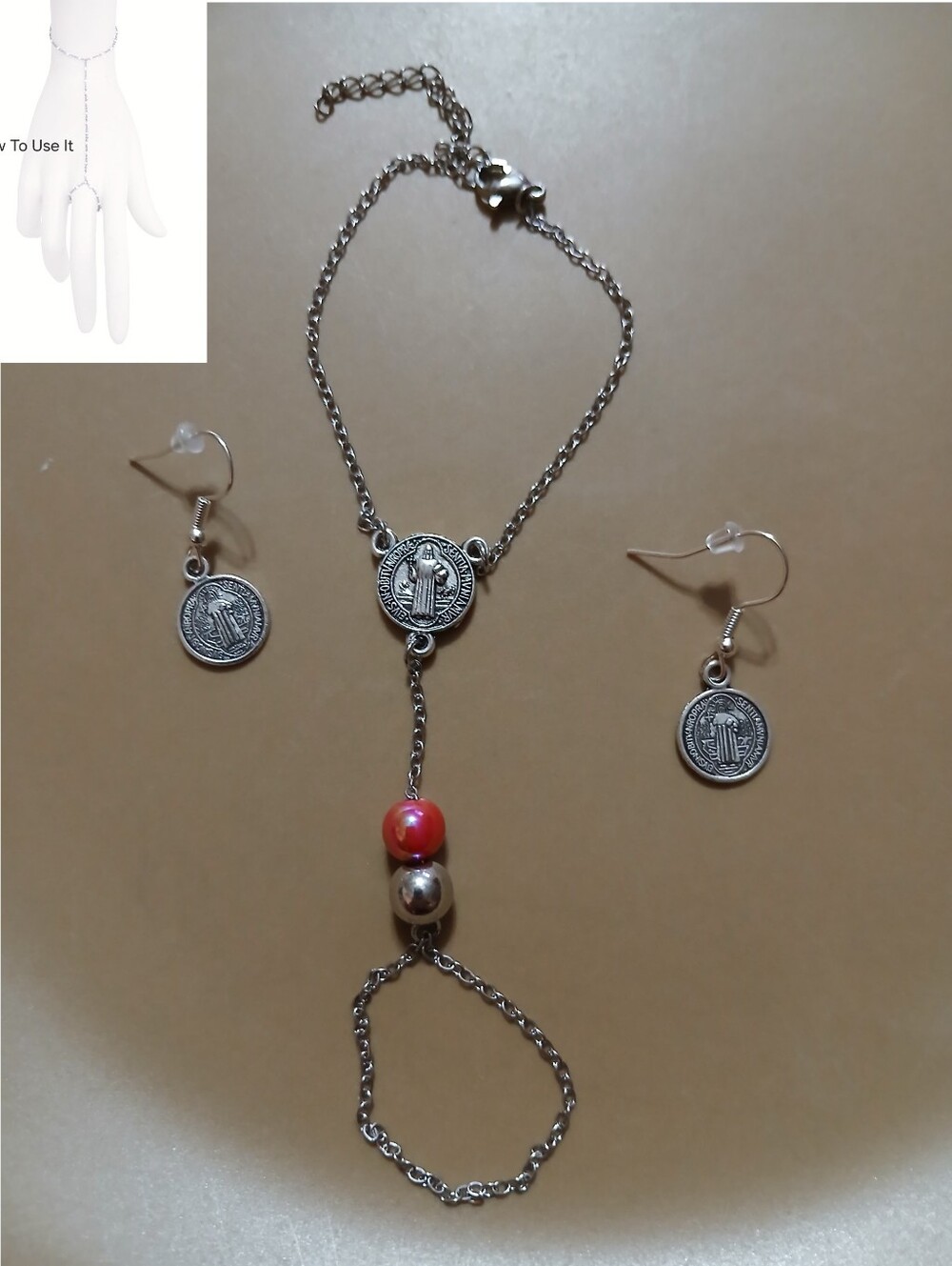 Silver-Tone St Benedict Medal Hand Chain with Pink Accent Bead And Earrings Set